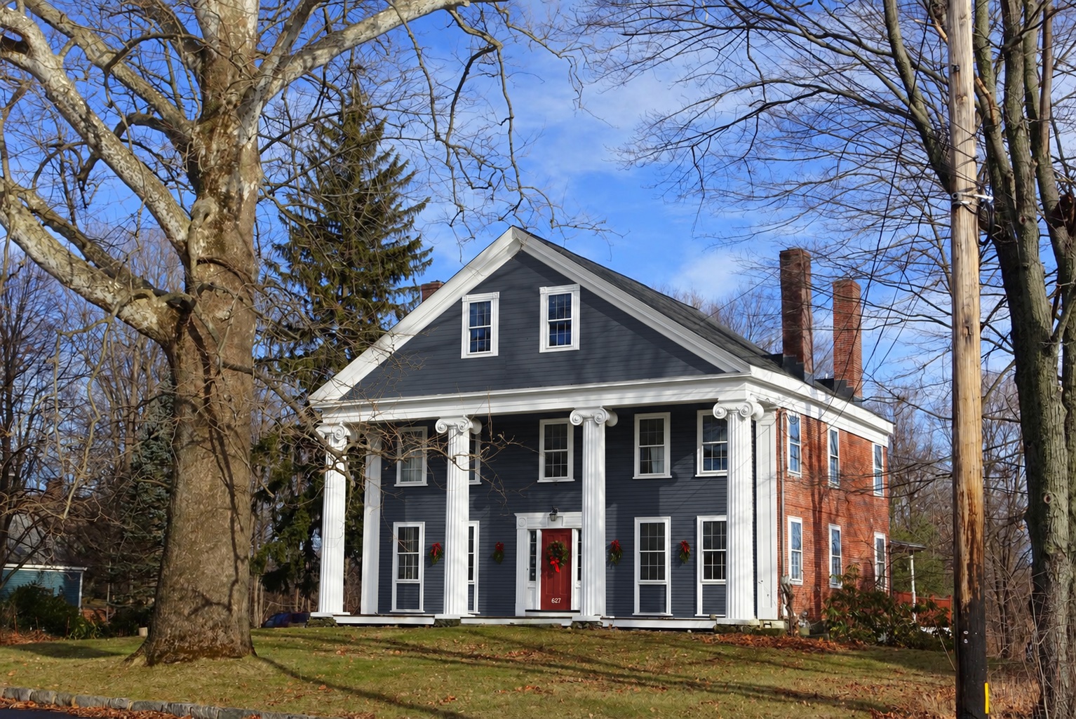A colonial house, repainted: Hale Navy and white